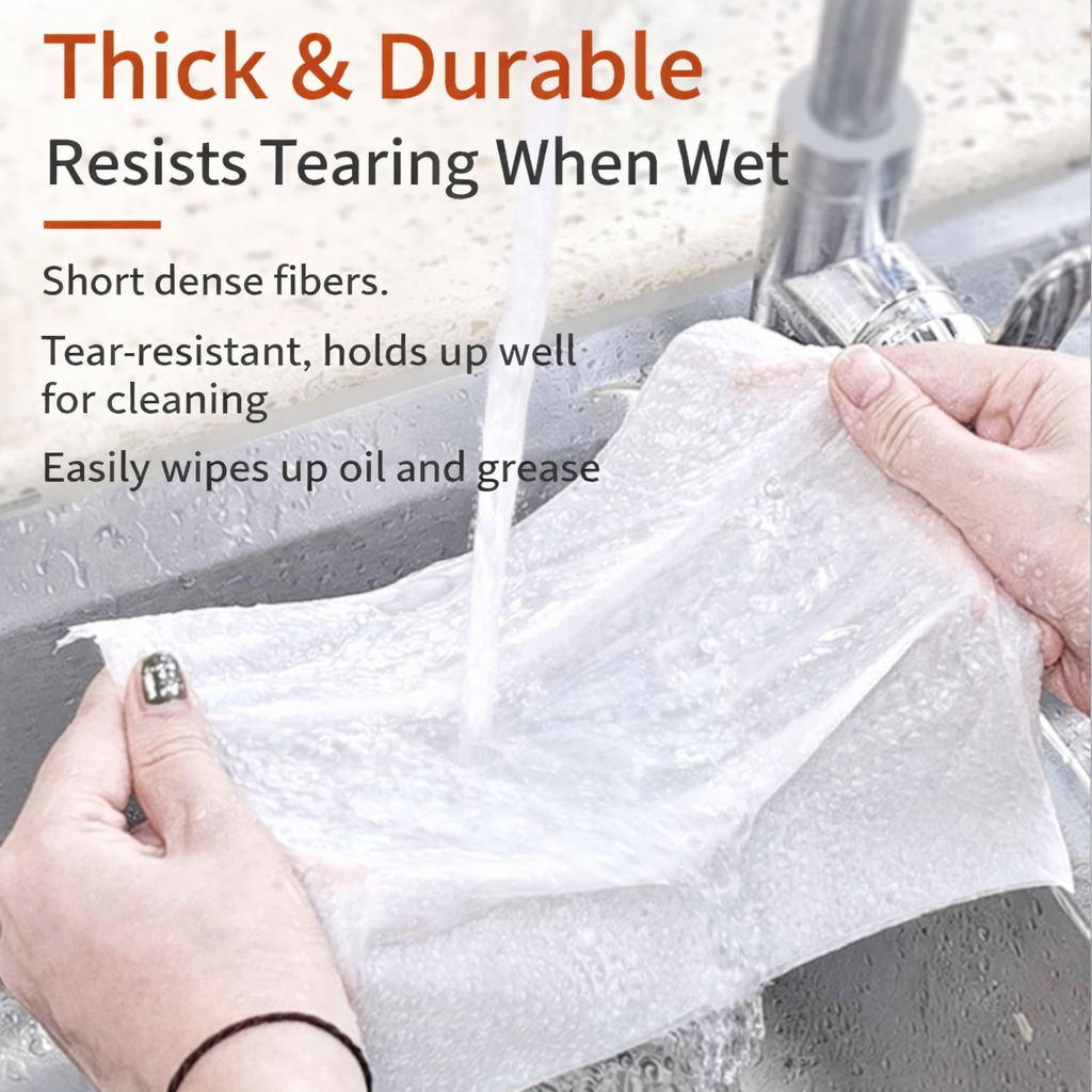 Kitchen towel being held under running water; shows thick, durable texture resisting tearing.
